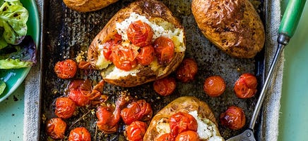 Baked potatoes with ricotta and roasted tomatoes