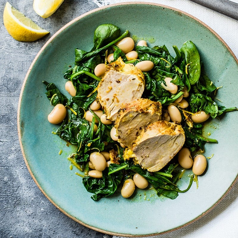 Zesty pork with spinach and butter beans