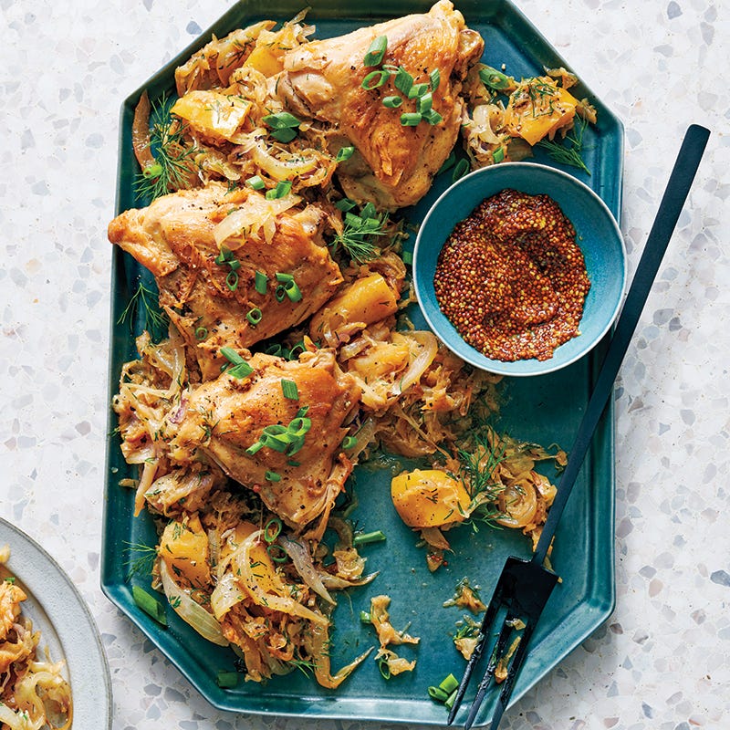 Chicken thighs with apple, onions, and sauerkraut