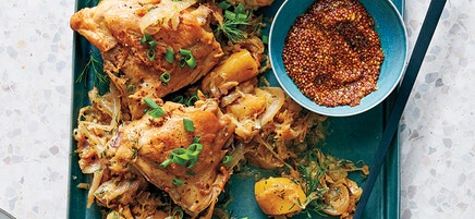 Chicken thighs with apples, onions, and sauerkraut