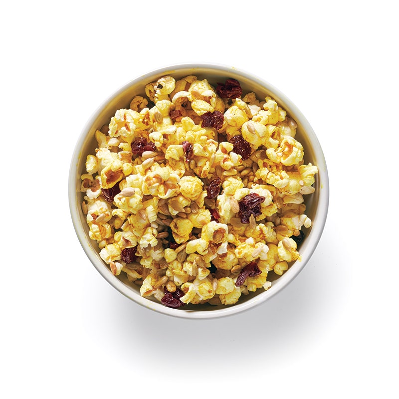 Curried popcorn with dried cherries