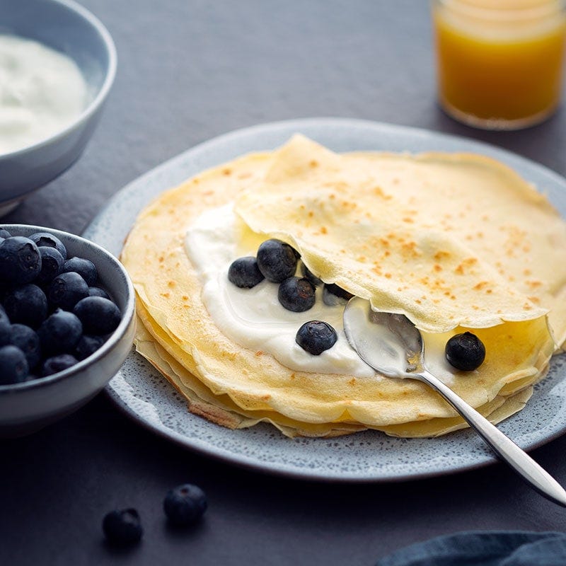 French crepes with yoghurt and blueberries