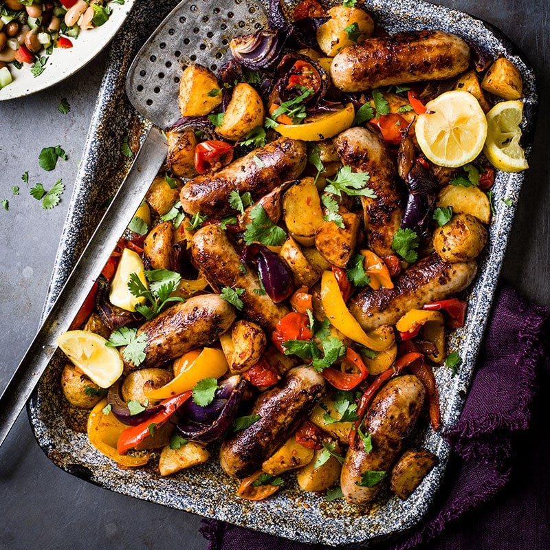 Harissa sausage tray bake