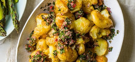 Smashed potatoes with chimichurri