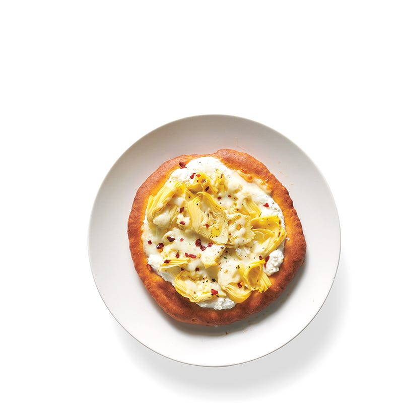 Foto van Pizza met artisjokken, ricotta en truffelolie door WW