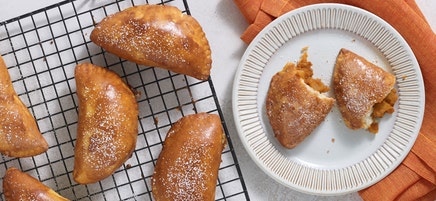 Spiced maple-pumpkin hand pies with cinnamon drizzle by Chef Eric Greenspan