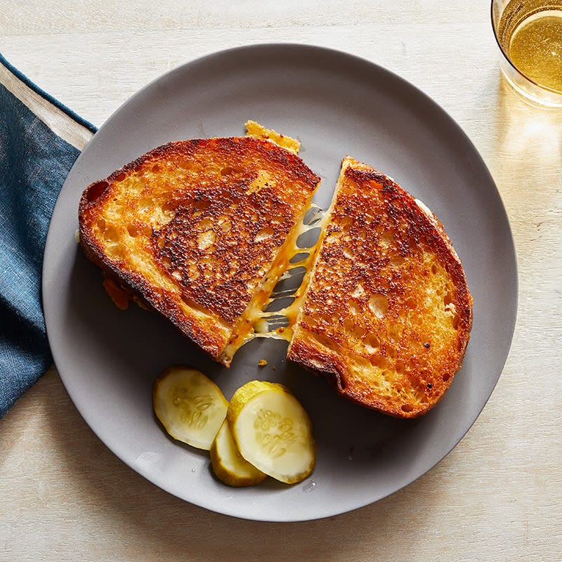 Photo of Grilled cheddar cheese sandwiches with pickles by WW