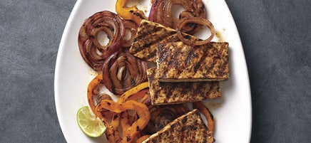 Coffee-chili rubbed tofu with peppers and onions