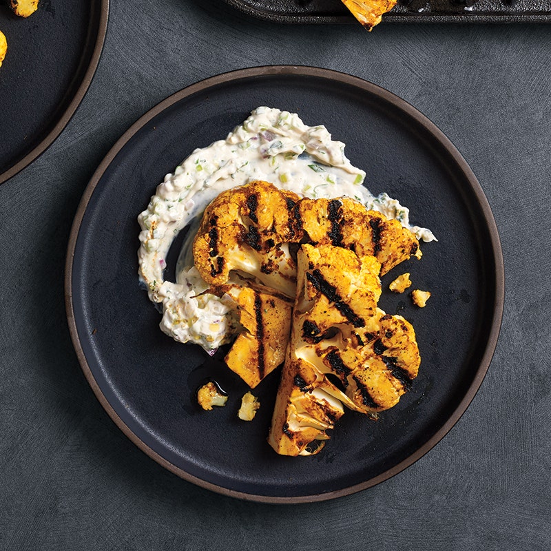 Tandoori-grilled cauliflower steaks with cucumber raita spread