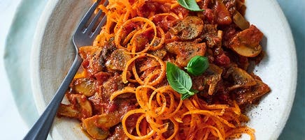 Mushroom bolognese with carrot 'spaghetti'