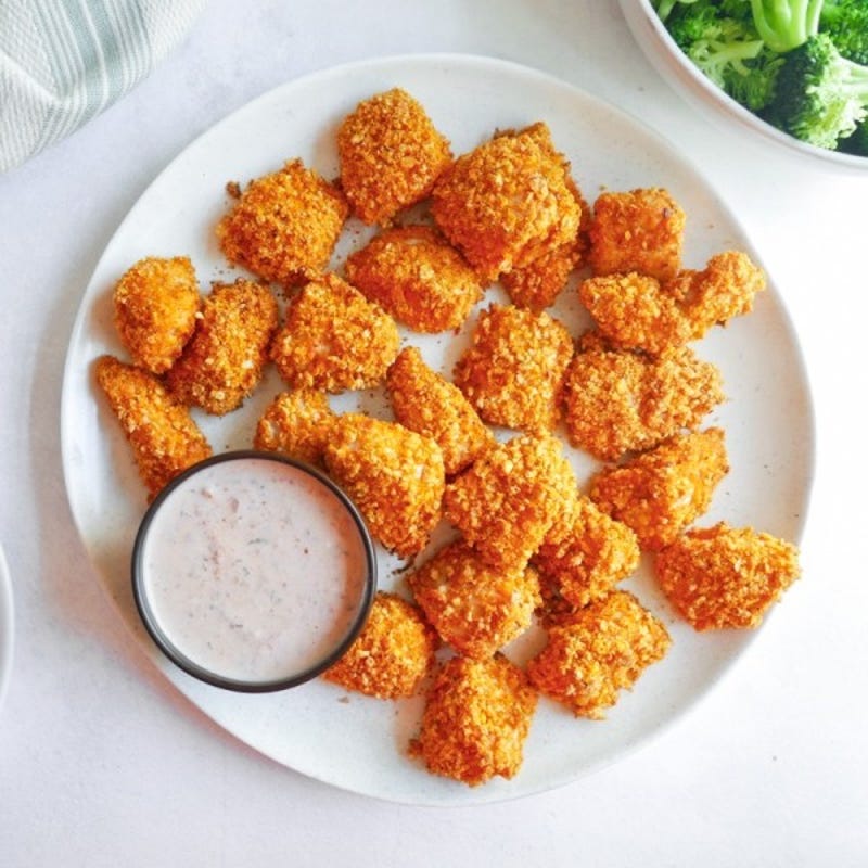 Photo of Nacho-coated turkey nuggets with creamy salsa dip by WW