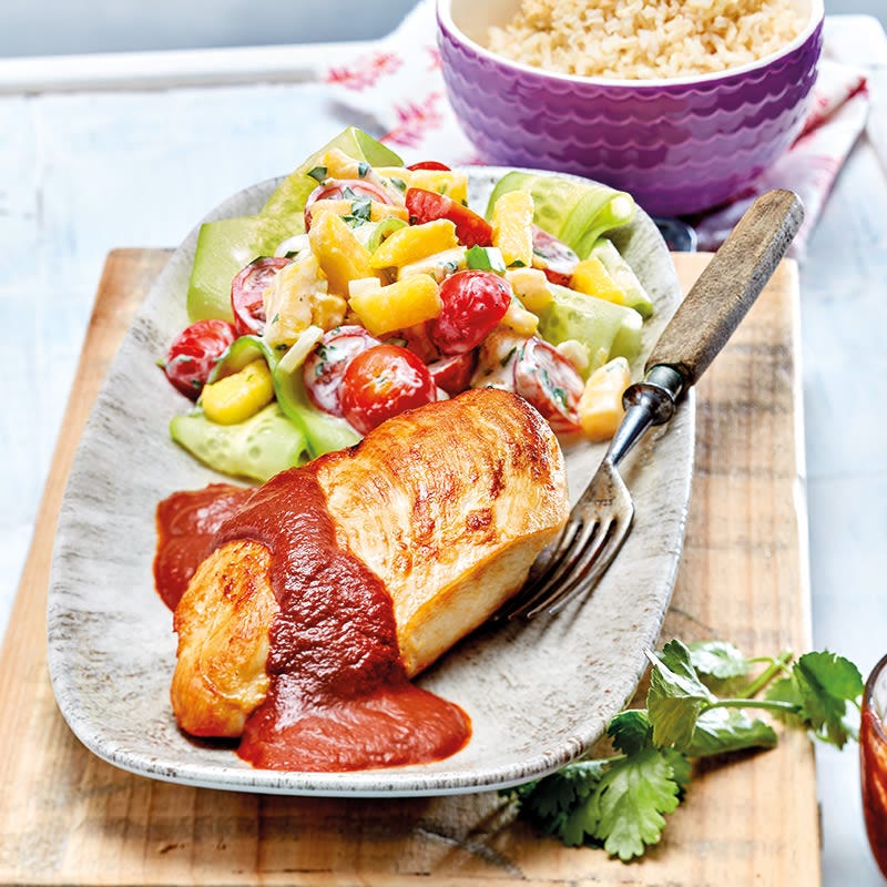 Poulet mit Reis und Chili-Schoko-Mole