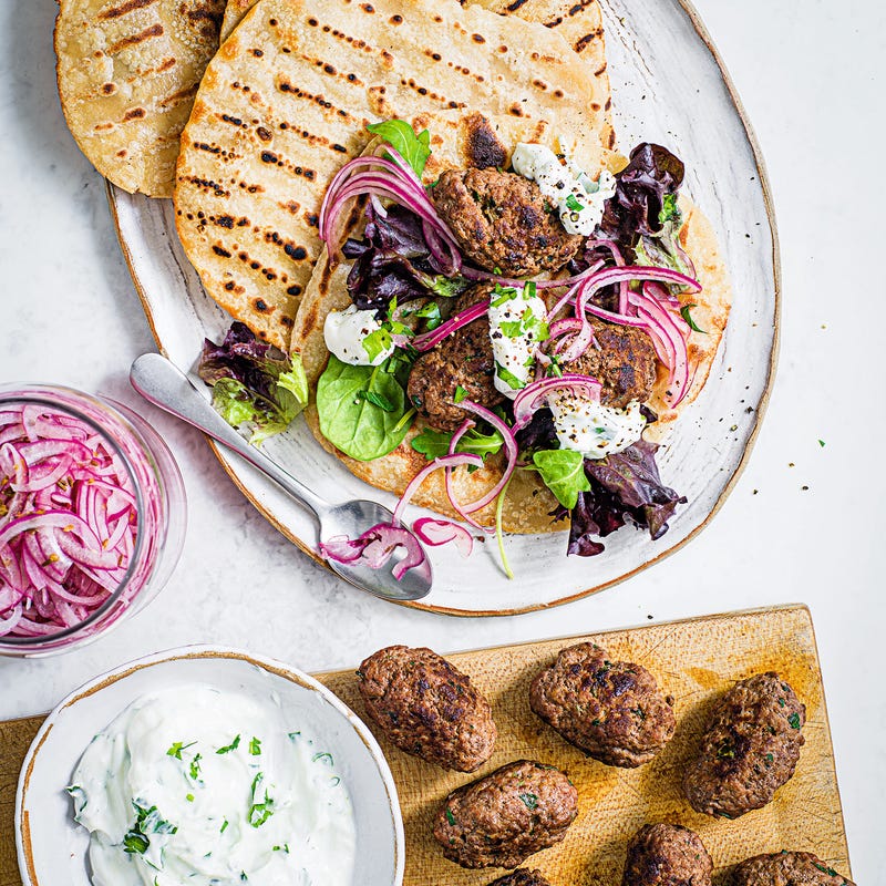 Photo of Beef koftas with flatbreads, salad & lemon yogurt dressing by WW