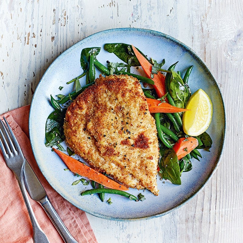 Crispy chicken schnitzel with vegetables