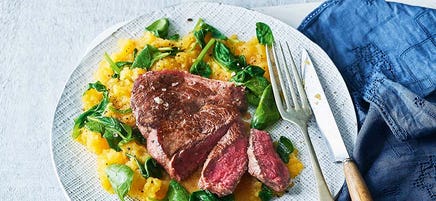 Grilled steak with sweet potato & spinach mash