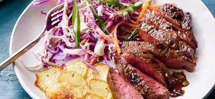 Marinated steak and chips with creamy coleslaw