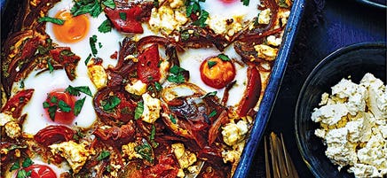 Baked eggs with harissa and feta