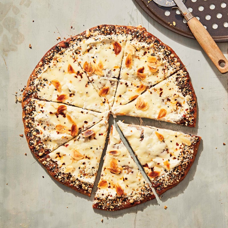 Grilled white pizza with everything bagel crust