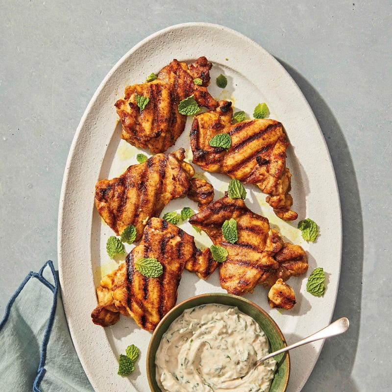 Grilled Moroccan chicken with cumin-garlic yogurt sauce
