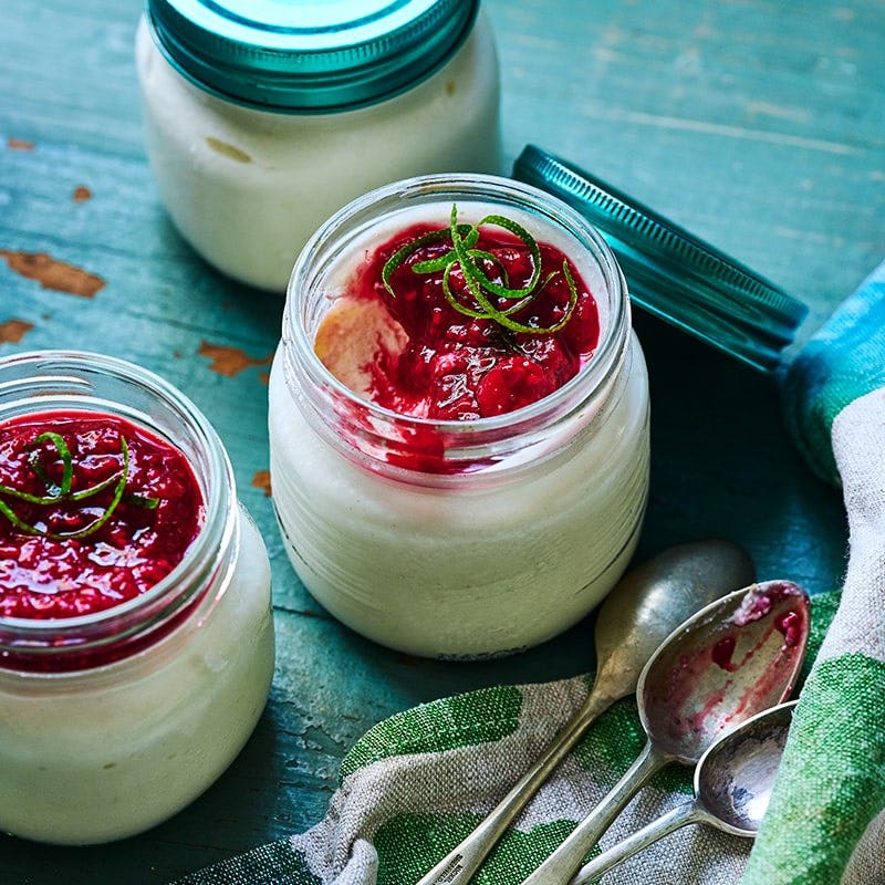 Raspberry-topped cheesecake pots