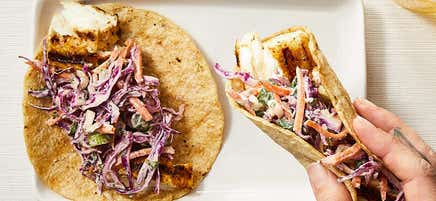 Fresh fish tacos with red cabbage slaw