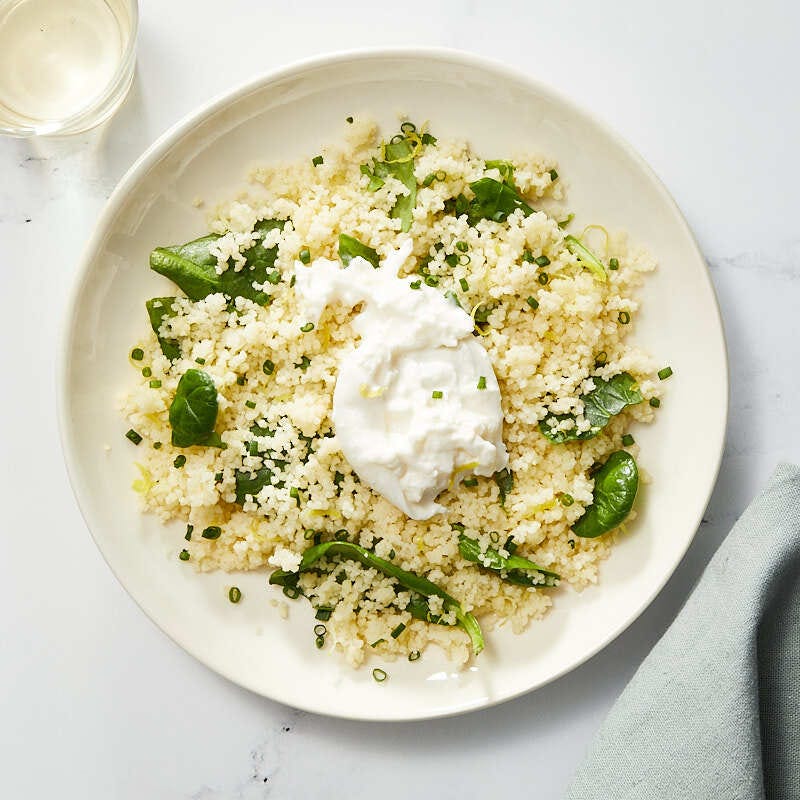 Lemony-spinach couscous with creamy burrata by Millie Peartree