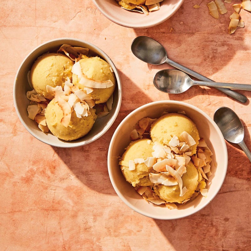 Two small bowls of "nice" cream topped with toasted coconut