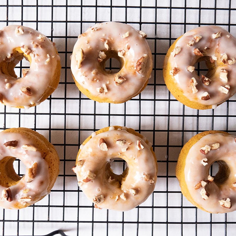 Cardamom sweet potato doughnuts with yogurt glaze