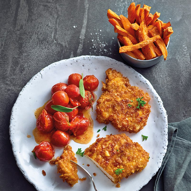 Foto van Krokante schnitzel met salietomaten door WW