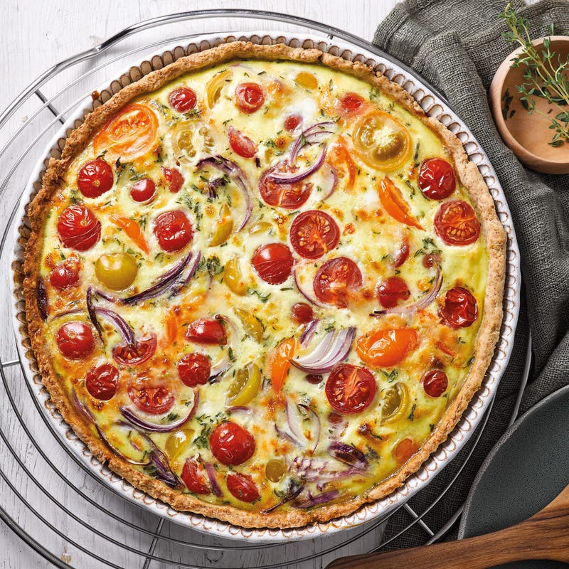 Foto van Kleurrijke tomatenquiche met ui door WW