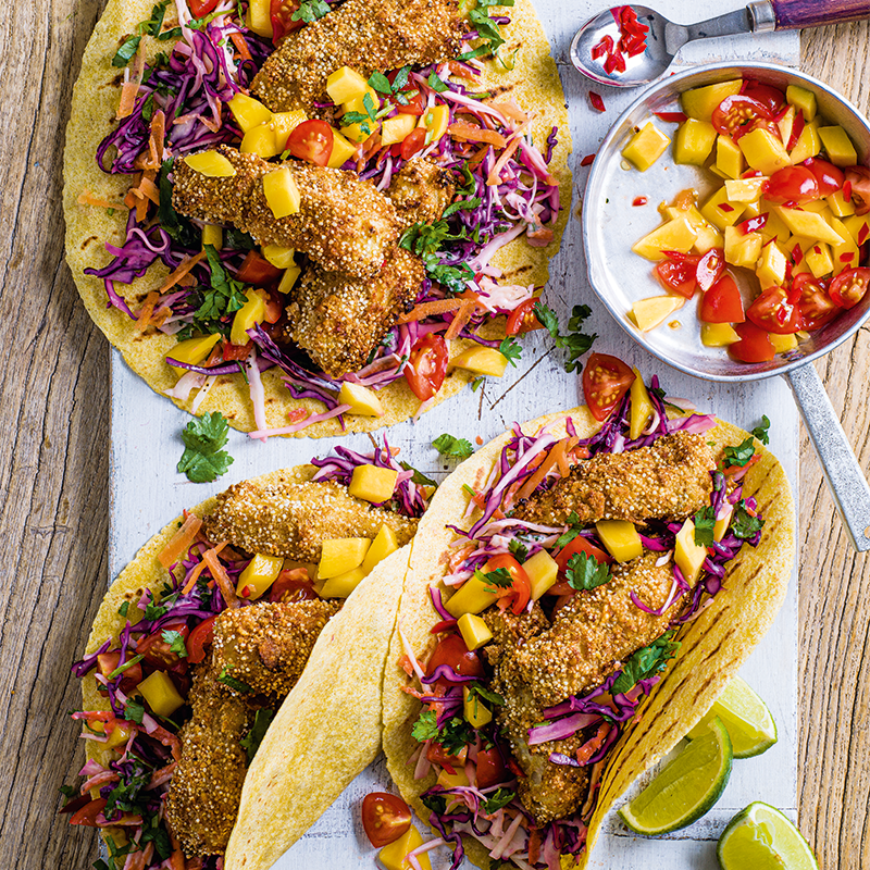Crispy fish tacos with lime slaw and mango salsa