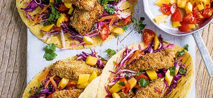 Crispy fish tacos with lime slaw and mango salsa