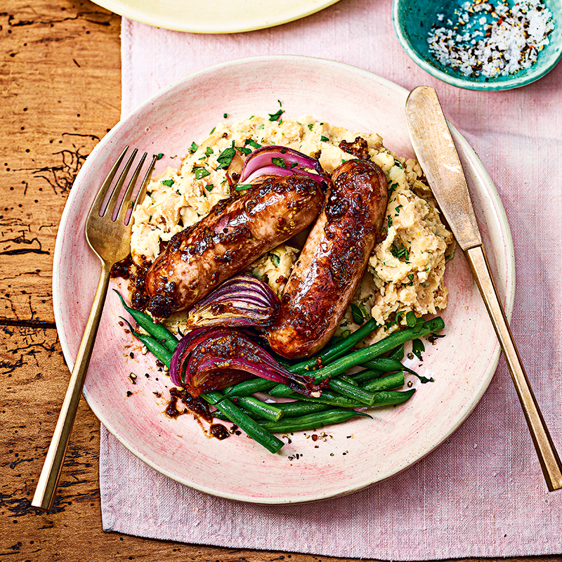 Balsamic-glazed sausages with roasted garlic mash