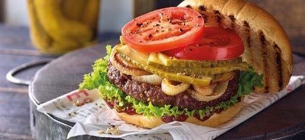 Kruidige burger met gebakken uien