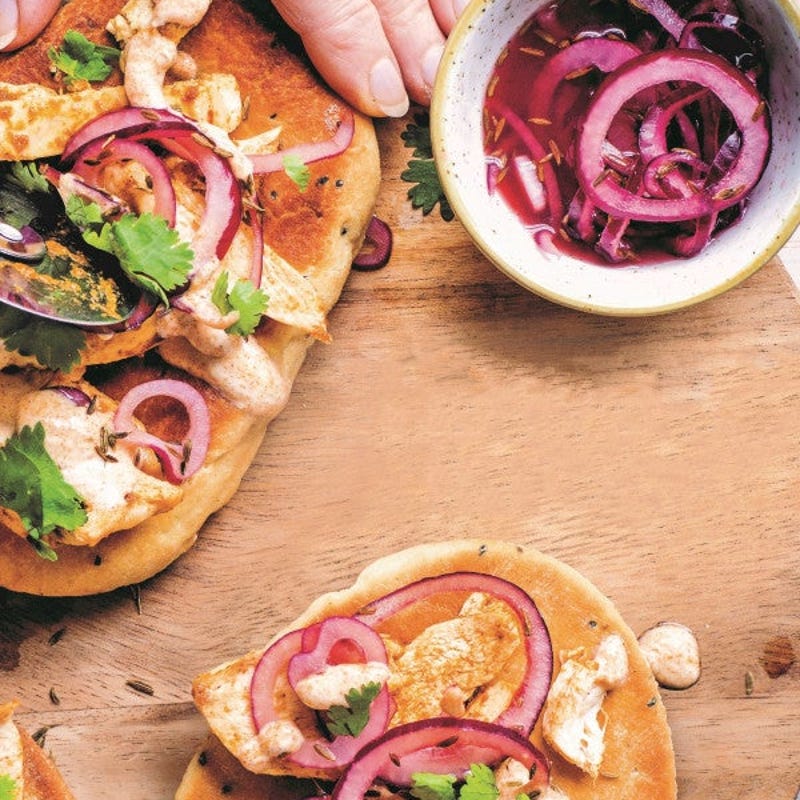 Photo de Pizza au poulet tikka masala et oignon confit prise par WW