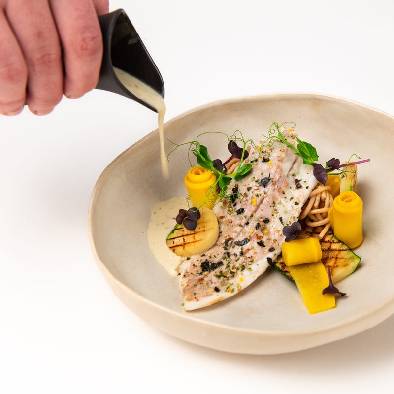 Foto van Anne-Sophie's Zeebaars met gegrilde courgette en saus van zeewier door WW
