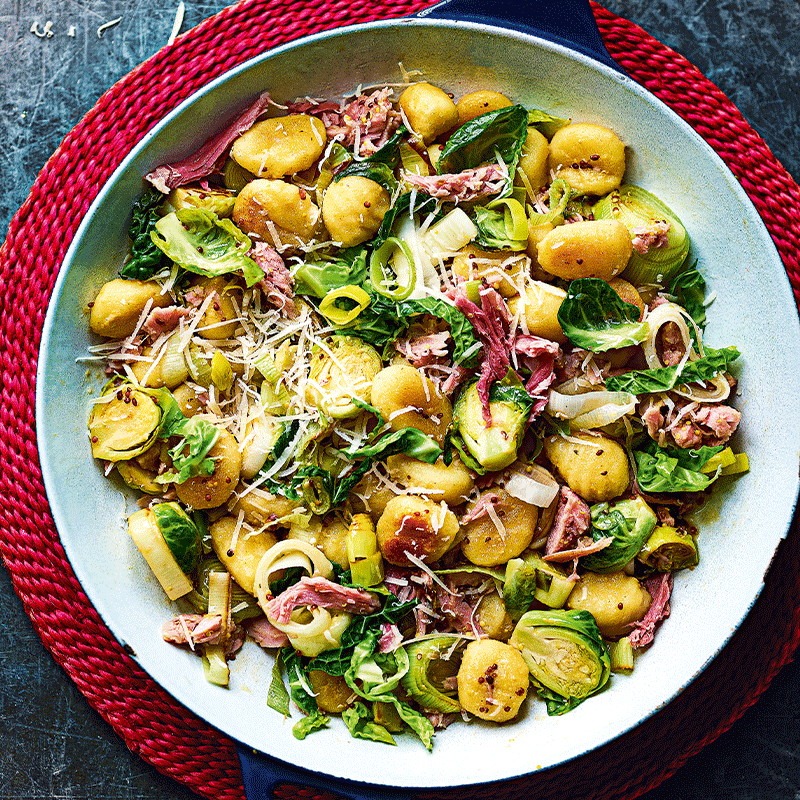 Gnocchi with ham and shredded greens
