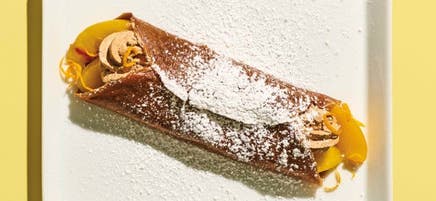 Chocolate crepes with peaches