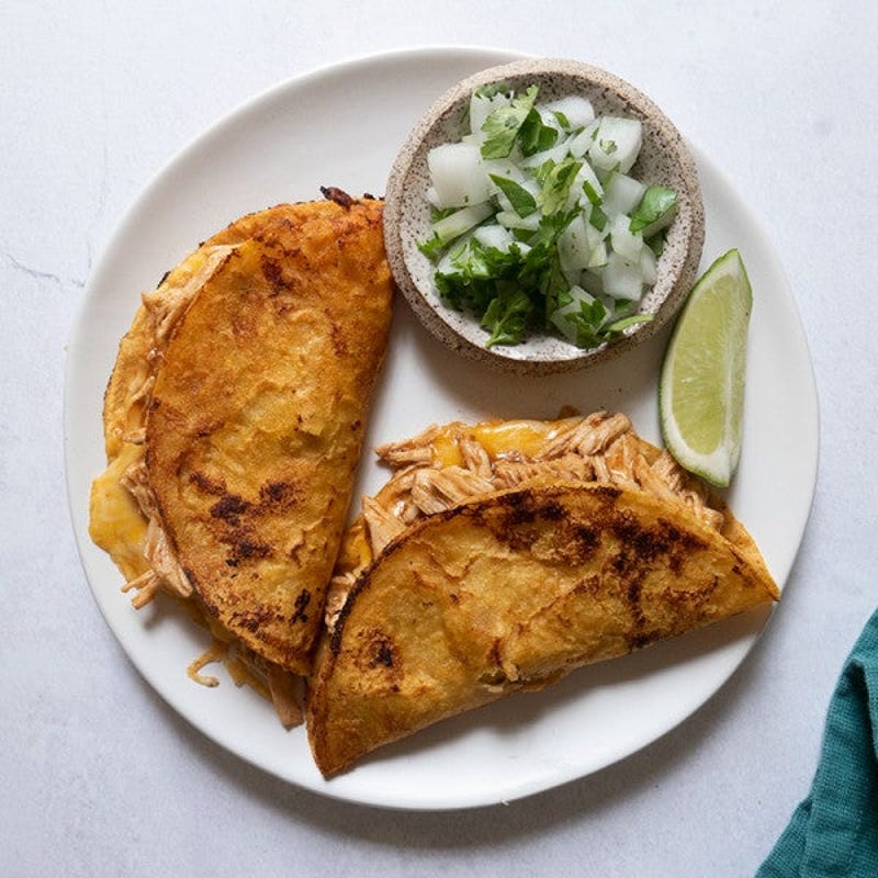 Photo of Cheesy Chicken Birria Tacos by WW