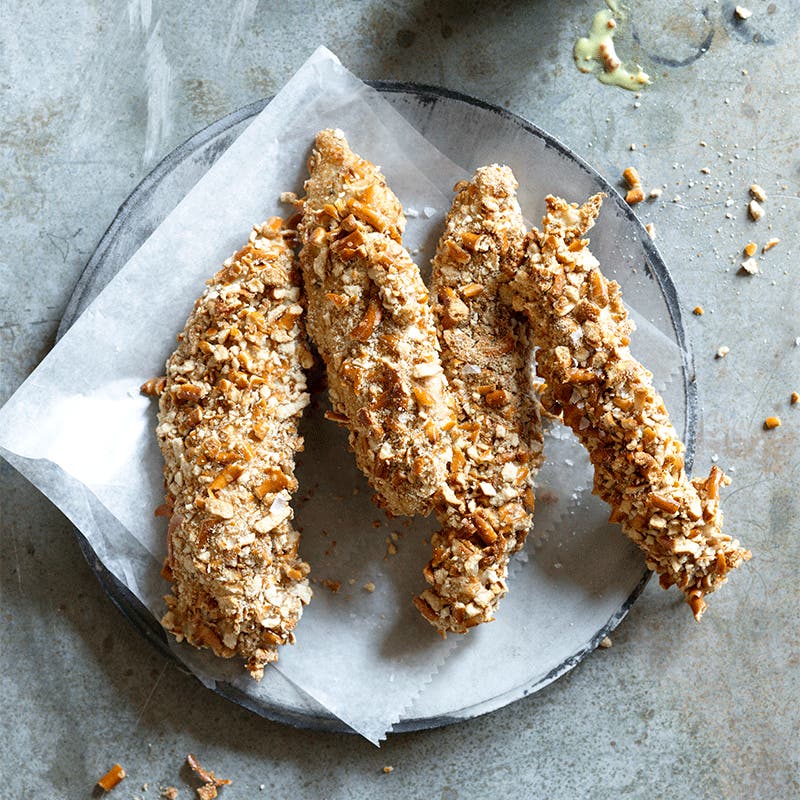 Pretzel-crusted chicken tenders with honey-mustard dip