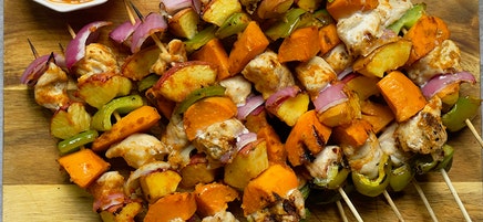 BBQ chicken skewers with peaches and sweet potatoes