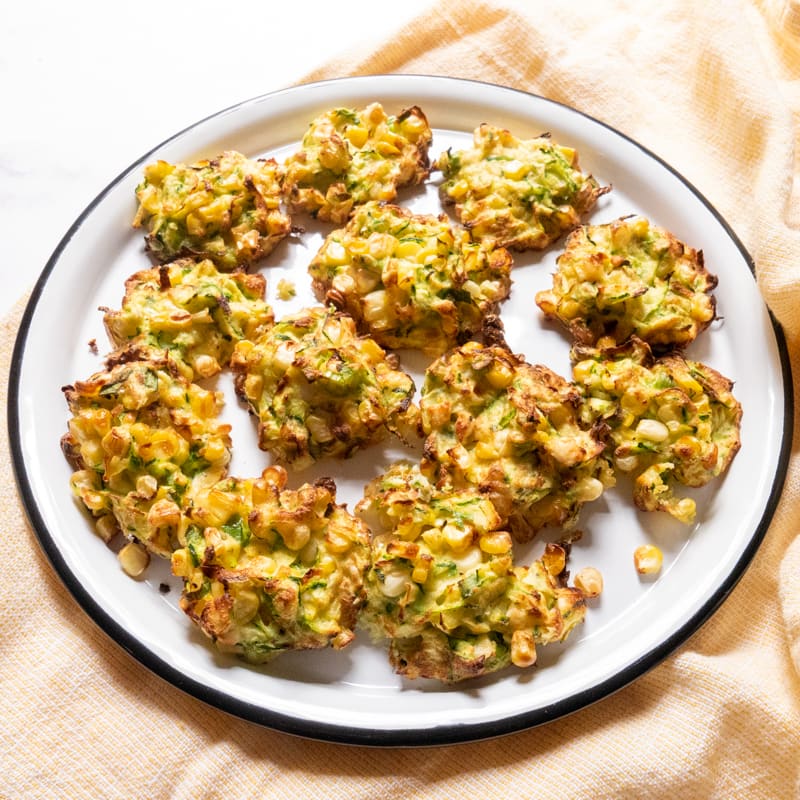 Air-fryer zucchini, corn and feta fritters