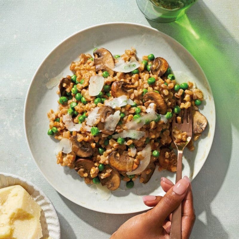 Photo of Instant Pot Farro Risotto with Mushrooms & Peas by WW