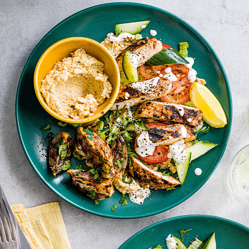 Kebab-shop hummus with sumac chicken and onion salad
