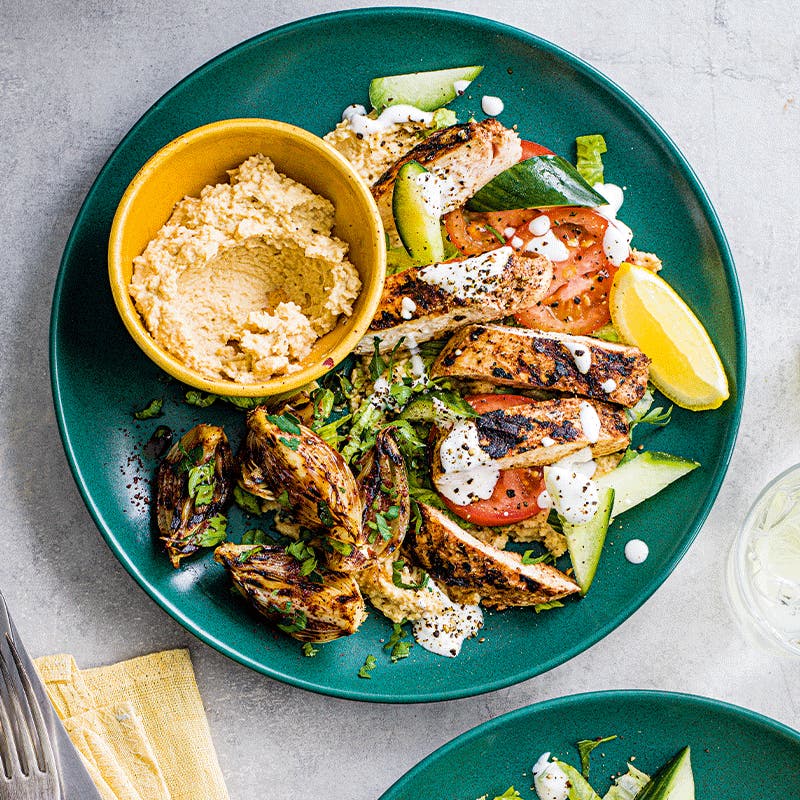 Kebab-shop hummus with sumac chicken and onion salad