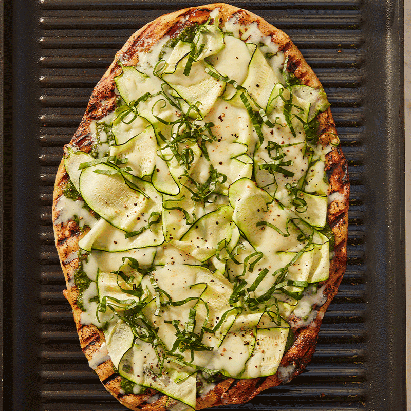 Pesto and zucchini pizza