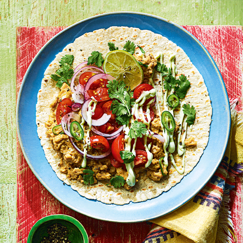 Breakfast tacos with avocado and lime sauce