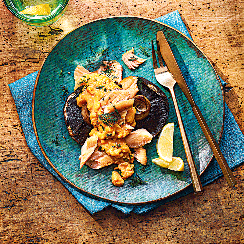 Scrambled eggs with mushrooms and hot smoked trout