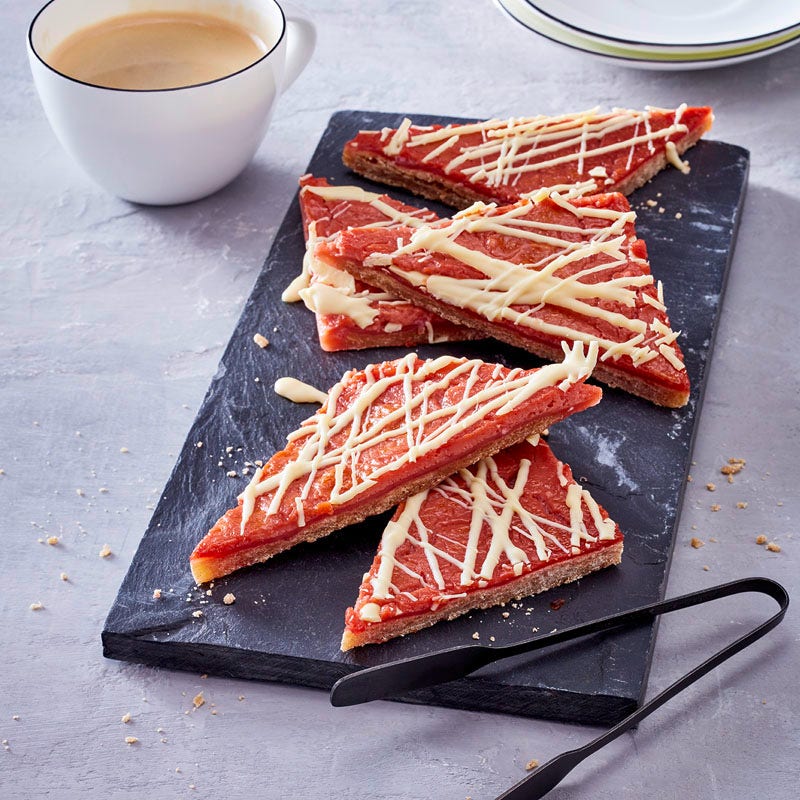 Pink-Grapefruit-Ecken mit weisser Schokolade