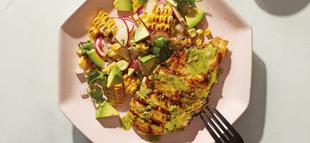 Coriander chicken with avocado and corn salad